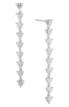 A line of faceted cubic zirconia illuminates these stunning drop earrings that are hand-polished to an exquisite shine. 2" drop; 1/4" width Post back Rhodium plate or 18k-gold plate/cubic zirconia Imported Diamond Cut Crystal Drop Earrings For Formal Occasions, Formal Crystal Drop Earrings With Diamond Cut, Cubic Zirconia Dangle Linear Earrings In Brilliant Cut, Cubic Zirconia Brilliant Cut Dangle Earrings, Cubic Zirconia Long Drop Earrings, Cubic Zirconia Drop Earrings Diamond Cut, Diamond Cut Cubic Zirconia Drop Earrings, Long Drop Cubic Zirconia Linear Earrings, Long Drop Linear Earrings With Cubic Zirconia