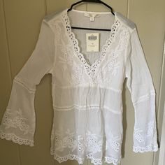 White Lace Embroidered Tunic With Long Sleeves Bohemian White Embroidered Tunic Top, Spring V-neck Tunic With Embroidered Neckline, Red Tunic Top, Bohemian V-neck Blouse With Lace Trim, White Bohemian V-neck Lace Top, White Embroidered V-neck Tunic, Hooded Tunic, Black Tunic Tops, Red Tunic