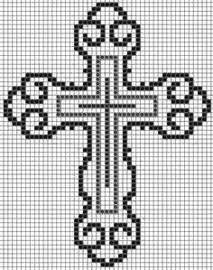 a cross is shown in black and white, with an intricate design on the front