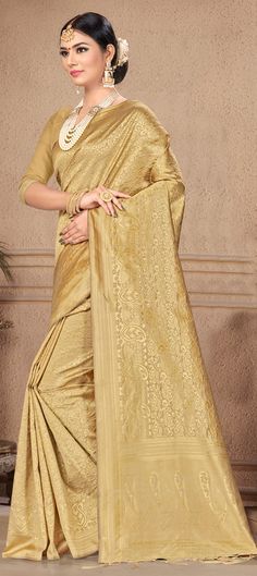 Cost Includes Saree,Unstitched BlouseFall & Edging Work Description: Gold color Saree in Banarasi Silk, Silk fabric with Weaving work Fabric: Banarasi Silk, Silk Work: Weaving Color Family: Gold Style: South Occasion: Traditional Saree Dimension: 530 Cm x 110 Cm ( L x W) Blouse Length: 80 Cm Approx Washing Instruction: Dry Wash Jamawar Blouse Piece For Puja, Gold Salwar Kameez With Pallu, Diwali Saree With Zari Work And Long Sleeves, Gold Blouse With Dupatta For Puja, Wedding Long Sleeve Blouse With Zari Weaving, Long Sleeve Blouse Piece With Zari Weaving For Wedding, Art Silk Saree With Long Sleeves For Eid, Art Silk Long Sleeve Saree For Eid, Blouse With Zari Weaving For Eid And Traditional Ceremonies