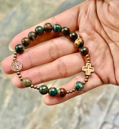 Earthy Spacer Beads Bracelets As Gift, Spiritual Copper Bracelets With Round Beads, Brown Nickel-free Spiritual Beaded Bracelets, Nickel-free Brown Spiritual Beaded Bracelets, Spiritual Nickel-free Copper Bracelets, Nickel-free Copper Spiritual Bracelets, Rosary Jewelry, Decade Rosary, St Benedict