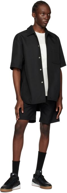 Polyester twill shirt. · Open spread collar · Button closure · Patch pocket · Logo flag at outseam Supplier color: Black Black Hammer, Casual Shorts For Men, Skater Shirts, Sailor Shorts, Pocket Logo, Knee Length Shorts, Twill Shirt, Twill Shorts, Embroidered Shorts