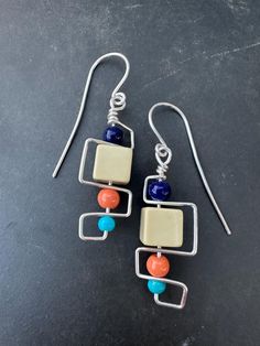 Introducing our Retro Collection from Nonnie Up! These earrings are a delightful throwback, featuring an eclectic mix of geometric designs, colorful beads, and playful elements that capture a vintage vibe. Each piece is crafted with care, incorporating materials like glass beads, ceramic accents, and wire frames that dance between funky and sophisticated. Whether you're looking to add a splash of color or a dash of nostalgia to your outfit, this collection brings a creative twist to classic designs. Perfect for anyone who loves a unique, artisan touch in their accessories, these earrings are sure to become a treasured part of your jewelry box.  **Spot an earring that caught your eye but dreaming of a different bead color? 🌈✨ Pop us a message! We love making these earrings just right for y Cheap Retro Dangle Jewelry, Cheap Colorful Retro Jewelry, Affordable Handmade Retro Jewelry, Retro Multicolor Drop Earrings, Modern Multicolor Dangle Jewelry, Retro Multicolor Jewelry With Matching Earrings, Modern Colorful Handmade Jewelry, Unique Multicolor Geometric Jewelry, Multicolor Nickel-free Retro Jewelry