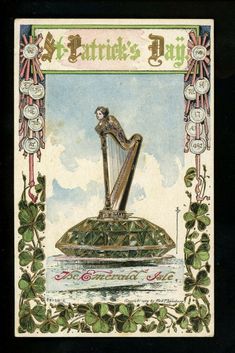 an image of a card with a harp on top of it and shamrocks around the edges