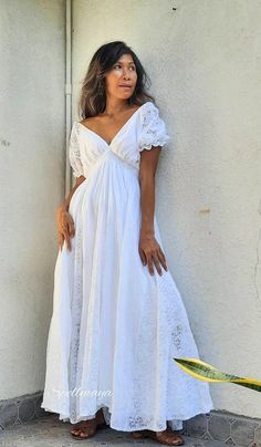 Handmade bohemian v neck maxi dress with floor length full circle skirt. There is the lace between a skirt with lining inside. Puffy lace sleeves. Elastic waist. 100% soft Cotton. There is 2 colors White and Off White. NOTE: Dress TK off white with white lace. waist 21 up to 45 inches. Dress SP off white with cream lace. waist 22 up to 46 inches. Dress E1 off white with white lace. White color lace FV with white lace. PLEASE LEAVE YOUR PHONE NO. AND EMAIL ADDRESS. Measurements: Bust up to 46 in White V-neck Maternity Dress For Summer, Flowy Bohemian Dress With Empire Waist, Elegant Summer Maxi Maternity Dress, Maternity Lace Trim Maxi Dress, White Summer Maternity Dress For Wedding, White Maternity Dress For Summer Wedding, White Summer Maternity Wedding Dress, White Maternity Wedding Dress For Summer, Bohemian Empire Waist Dress For Garden Party