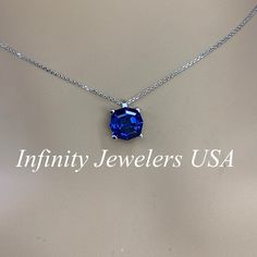 "This necklace is a web cut lab created blue sapphire, 18\"cable chain, 14k white gold #6390 September Birthstone -Approximate total carat weight: 3.30ctw diamond equivalent -Center Stone Size: 9x9mm approx. 3.30ct diamond equivalent -Center Stone Shape: web cut / octagon -Gem Type: lab created blue sapphire -Stone Clarity: VS2 -Stone Color: blue -Moh's Scale: 9 hardness -Metal Type and Purity: 14k white gold -Setting: 4 prong basket -Chain: 18\" delicate 14k gold chain / heavier option with lob White Gold Jewelry With Diamond Cut Lab-created Sapphire, Sapphire Jewelry With Brilliant Cut Round Stone, Fine Jewelry With Diamond Cut Lab-created Sapphire, Fine Jewelry With Lab-created Sapphire And Diamond Cut, Lab-created Sapphire Jewelry With Brilliant Cut, Brilliant Cut Lab-created Sapphire Jewelry, Lab-created Sapphire Jewelry In Prong Setting, Sapphire Birthstone Necklace In Lab-created Sapphire, Blue Cubic Zirconia Necklace With Diamond Cut