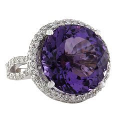 Stamped: 14K White GoldTotal Ring Weight: 9.0 GramsRing Length: N/ARing Width: N/AGemstone Weight: Total Natural Amethyst Weight is 12.31 Carat (Measures: 15.83x15.85 mm)Color: PurpleDiamond Weight: Total Natural Diamond Weight is 1.50 CaratColor: F-G, Clarity: VS2-SI1Face Measures: 19.52x19.72 mmSku: [702199W] Luxury Round Gemstones For Formal Occasions, Luxury Round Gemstones For Formal Events, Luxury White Gold Amethyst Ring With Diamond, Fine Jewelry Amethyst Diamond Ring With Prong Setting, Luxury White Gold Amethyst Ring With Halo Setting, Luxury Amethyst Ring With Halo Setting, Luxury Purple Gemstones With Halo Setting, Luxury Purple Sapphire Ring, Luxury Amethyst Ring With Brilliant Cut Diamond