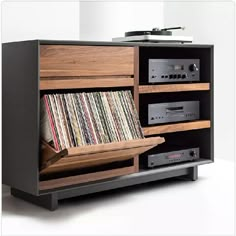 an old record player is turned into a stereo cabinet