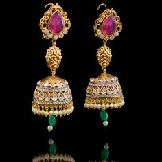 Our Saarika Look sets the mood for vintage glamour with Mughal undertones! A stunning mala necklace in colorful combination of ruby, emerald and CZ stones and beads. Approximate mala length is 15". The look includes a pair beautiful jhumkey earrings. Approximate earrings length is 3.5". Gold-plated on high-quality brass as base metal. In-stock & ready-to-ship. *Please Note: We use faux stones and beads in all of our jewelry. Unique Gift Cards, Ruby Emerald, Mala Necklace, Faux Stone, Vintage Glamour, Cz Stone, The Mood, Base Metal, Beautiful Jewelry