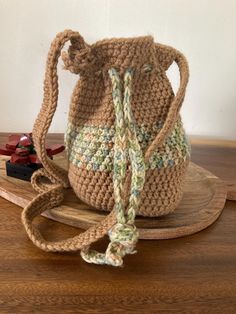 Retro Crochet Bucket Bag Tan, beige and green.  Hand made #retro #hippie #vintage #fall  #crotchet Crochet Bucket Bag, Retro Crochet, Beige And Green, Crochet Bucket, Green Hand, Vintage Fall, Purses And Handbags, Bucket Bag, Shoulder Bags