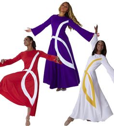 three women in long dresses are posing for the camera with their arms spread out and hands outstretched