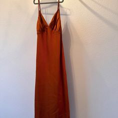 Ruched Satin Slip Midi Dress Copper Nwt Size M Orange Silk V-neck Dress, Orange Spaghetti Strap Lined Dress, Orange Sleeveless Maxi Dress For Formal Occasions, Orange Satin Maxi Dress For Party, Fitted Orange Maxi Dress For Date Night, Orange Silk Maxi Dress For Evening, Orange Silk Maxi Dress For Party, Orange Silk Evening Maxi Dress, Orange Ruched Dress With Spaghetti Straps