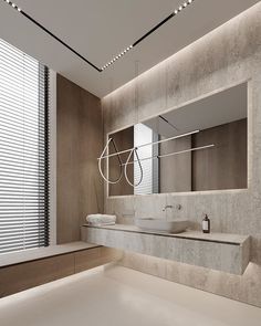 a modern bathroom with two sinks and large mirrors on the wall, along with white countertops