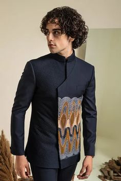 Navy blue bandhgala with contrast geometric embroidery detailing. Comes with trouser.
Components: 2
Pattern: Embroidery
Type Of Work: Thread, Glass Bugles
Neckline: Mandarin Collar
Sleeve Type: Full
Fabric: Terry Rayon
Color: Blue
Other Details: 
Shoulder pads
Asymmetric detailing
Occasion: Sangeet - Aza Fashions Embroidered Bandhgala, Mens Pants Fashion Casual, Indian Wedding Clothes For Men, Weddding Dress, Formal Attire For Men, Wedding Kurta For Men, Stylish Mens Suits, Indian Groom Wear, Kurta Patterns