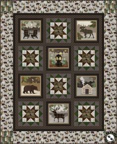 a quilt with animals on it is shown in black and green colors, including an animal motif