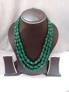 AAA 734 Carat Emerald beryl Oval Shape Fine Quality Smooth Beads With Adjustable Cord Necklace Stone : Emerald beryl Shape :- Oval Size :-6x8 - 12x17mm length - 18 inch, 3 line strings Weight :- 734 carat Polish :- Handmade color - green It is known as the 'love stone' as the message it emits is the strong vibration of unconditional love, joy, warmth and healing. As quartz crystals are profound amplifiers of energy, it may help to kindle happiness, love, romantic feelings and sensuality. It is g Elegant Green Oval Bead Necklaces, Elegant Green Necklaces With Oval Beads, Elegant Green Oval Beaded Necklaces, Elegant Gemstone Oval Beads, Oval Green Beaded Jewelry, Green Oval Beaded Jewelry, Elegant Emerald Necklace With Oval Gemstone Beads, Green Oval Gemstone Beads Necklace, Green Oval Polished Beads Jewelry