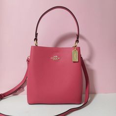 New Coach Small Town Bucket Bag Strawberry Haze 1011 $350 Polished Pebble Leather Center Zip Compartment| Snap Closure Handle With 6 3/4" Drop Detachable Strap With 22" Drop For Shoulder Or Crossbody Wear 8 1/2" (L) X 8 3/4" (H) X 4" (W) Pink Bucket Bag With Detachable Handle For Formal Occasions, Pink Formal Bucket Bag With Detachable Handle, Formal Pink Bucket Bag With Detachable Handle, Elegant Pink Bucket Bag With Double Handle, Formal Pink Top Handle Bucket Bag, Elegant Pink Bucket Bag For Formal Occasions, Designer Pink Satchel Bucket Bag, Elegant Pink Bucket Bag For Travel, Coach Rectangular Bucket Bag With Detachable Strap