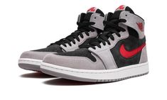 The Air Jordan 1 Zoom CMFT 2 “Black/Fire Red/Cement Grey” is the second version of the modern spin on the vintage basketball shoe with a decidedly Chicago Bulls-esque design.  The Jordan 1 Zoom Comfort 2 is the second version of the Jordan 1 Zoom Comfort shoe that debuted as a lifestyle take on the classic silhouette.  On the “Black/Fire Red/Cement Grey,” the model features a black suede base with Cement Grey suede overlays.  A Fire Red cut-out Swoosh appears on the sides and a red ��“Wings” logo Popular Sneakers, Jordan 1 High Og, Black Fire, Jordan Sneakers, Air Jordan 1 Retro High Og, Air Jordan 1 Retro High, Nike Dunk High, Red Nike, Nike Shox