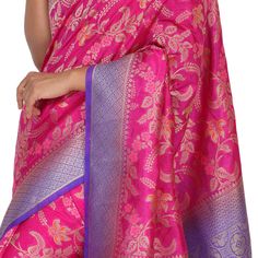 Introducing the Banaras Tilfi Sari with Pattu Border - a resplendent sari that is perfect for making a regal statement. Ideal for special occasions, this sari features a beautiful pink hue and is adorned with a traditional pattu border in purple. The intricate fall and pico work add to the overall allure of the sari, while the stitched blouse completes the look. Whether you're attending a wedding or a festive occasion, make sure to turn heads by draping yourself in this stunning sari. Fall and P Festive Slub Silk Dupatta, Festivals Brocade Pre-draped Saree With Pallu, Transitional Slub Silk Pre-draped Saree, Diwali Slub Silk Dupatta, Festive Pre-draped Chanderi Saree, Anarkali Pre-draped Tussar Silk Saree, Traditional Slub Silk Pre-draped Saree For Celebration, Festive Celebration Pre-draped Saree With Zari Weaving, Slub Silk Choli With Pallu