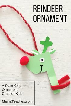 the reindeer ornament is made out of paper and yarn with text overlay