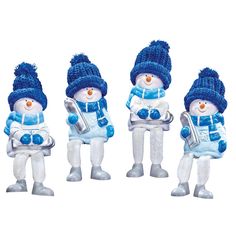 three snowmen are dressed in blue and white outfits