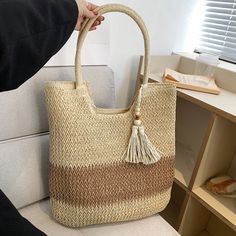 Discover Your Perfect Summer Companion Step into summer with style and practicality with our Boho Chic Summer Woven Tote Bag. Expertly handcrafted from natural paper rope, this bag marries environmental consciousness with chic design. Free from unpleasant chemical odors, it ensures safety and comfort for you and your family. The soft, contrasting tassels add a touch of elegance, making it a standout accessory for any summer outfit. Features That Speak Volumes Material: Durable and eco-friendly p Casual Beige Beach Bag With Tassels, Summer Beige Bags With Tassels, Beige Tassel Bag For Beach, Beige Tassel Bag For The Beach, Beige Tassel Beach Bag, Beach Beige Shoulder Bag With Tassels, Beige Tassel Shoulder Bag For Beach, Summer Brown Crochet Bag With Tassels, Brown Crochet Bag With Tassels For Summer