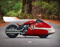 a red and white motorcycle parked on the side of a road in front of trees