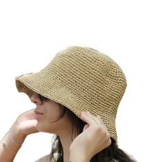 This hat is 100% handmade and crafted from raffia yarn. Raffia yarn is a natural and durable material, ensuring the hat's longevity. The wide brim of the hat is perfect for sun protection and offers a stylish look. This beige hat stands out with its simple and elegant design. It is an excellent accessory for both everyday use and outdoor activities like the beach. Its comfortable and lightweight structure ensures easy and prolonged wear. Raffia. You can store this hat, knitted from raffia rope, in a breathable cloth bag, protect it from fire and heat, and wipe the stains with a clean damp cloth. Woven Toquilla Straw Bucket Hat With Curved Brim, Natural Woven Bucket Hat With Short Brim, Natural Handwoven Bucket Hat With Curved Brim, Casual Straw Cloche Hat With Flat Brim, Woven Paper Straw Hat For Beach Season, Lightweight Brimmed Straw Hat, One Size, Woven Straw Brimmed Bucket Hat, Woven Straw Bucket Hat With Brim, Wide Brim Toquilla Straw Crochet Hat