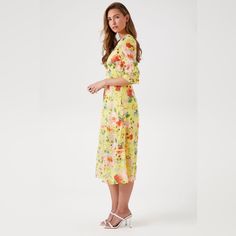 A Chiffon Midi Dress Featuring An Allover Floral Print, Plunging V-Neckline With Pintucked Trim, Shirred Bodice, Front Button-Loop Closures, 3/4 Sleeves With Ruffled Cuffs, Lace Trim, And A Concealed Back Zipper. New Without Tags. All Tags Cut Out To Prevent Returns To The Company. Inventory #P249 Yellow Chiffon Midi Dress, Yellow Chiffon Maxi Dress For Brunch, Fitted Yellow Chiffon Dress For Spring, Spring Chiffon Dress With Surplice Neckline, Spring Yellow Chiffon Midi Dress, V-neck Chiffon Dress For Garden Party, Yellow Feminine Midi Dress For Summer, Feminine Yellow Midi Dress For Summer, Yellow Maxi Chiffon Dress For Spring