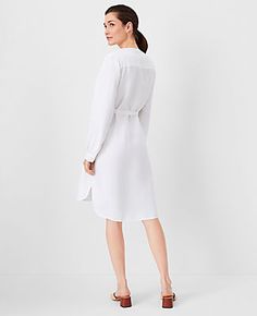 Elevate your weekend wardrobe with the Ann Taylor AT Weekend Eyelet Linen Blend Shirtdress. This chic piece combines effortless style with a touch of sophistication, perfect for relaxed outings or casual gatherings. 

- Size: Medium
- Color: White
- Gender: Female
- Material: 55% Linen, 45% Viscose
- Features: Crew neck, long sleeves with button cuffs, button front placket, self-tie waist
- Length: 21" from natural waist
- Care Instructions: Machine washable

Designed to hit above the knee, this Spring Shift Shirt Dress For Work, White Relaxed Fit Shirt Dress For Work, White Placket Dress For Work, White Shirt Dress For Work, Female Features, Style Steal, Blazer And Skirt, Weekend Wardrobe, Sleepwear & Loungewear