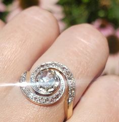 This is a very special ring. A large rose cut solitaire in the center surrounded by additional rose cut diamonds. In very good condition considering the age. Set in 18k yellow gold. Size 6.5 and easily sizable by any local jeweler. 1.09 ctw. A perfect example of a ring from this time period. Dazzling Rose Cut Diamond Anniversary Rings, Dazzling Rose Cut Diamond Rings For Anniversary, White Diamond Ring With Rose Cut For Anniversary, White Rose Cut Diamond Ring For Anniversary, White Rose Cut Diamond Anniversary Ring, Swirl Diamond Ring, Swirl Ring, Special Ring, Agate Ring