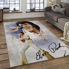 the elvis presley rug is on display in a living room