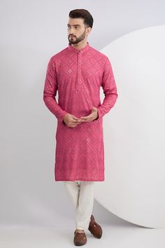 Pink kurta with chikankari thread embroidered floral and checkered motifs, embellished by sequins. Comes with a pant. - Aza Fashions Designer Embroidered Kurta For Diwali, Festive Designer Kurta With Chikankari Embroidery, Designer Chanderi Kurta For Eid, Designer Chanderi Kurta For Festive Occasions, Designer Traditional Wear With Chikankari Embroidery For Diwali, Designer Long Sleeve Kurta With Chikankari Embroidery, Designer Cotton Traditional Wear With Chikankari Embroidery, Designer Kurta With Chikankari Embroidery For Festivals, Designer Chikankari Embroidery Kurta For Transitional Season