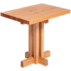 a small wooden table with two legs on each side and one leg raised up in the air