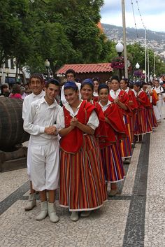 a group of people standing next to each other