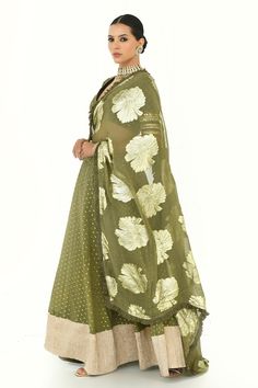 Olive green lehenga with golden petite patterns. Comes with sequin embroidered blouse and floral woven pattern frill bordered dupatta. - Aza Fashions Designer Green Lehenga With Sheer Dupatta, Unstitched Green Choli With Mirror Work, Green Unstitched Choli With Mirror Work, Designer Green Lehenga With Traditional Drape, Designer Green Choli With Sheer Dupatta, Green Lehenga With Sheer Dupatta In Traditional Drape, Traditional Green Choli With Dupatta, Green Lehenga With Traditional Drape For Designer Wear, Green Lehenga With Sheer Dupatta