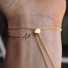 This beautiful love knot bracelet can be  great gift for any women for wedding, anniversary, graduation, birthdays, Christmas, valentine's day, etc. Love knot jewelry carried significant meaning throughout of centuries. it is also call as "true lover's knot".Metal: 14K solid goldBracelet is adjustable for comfort fit.------PRODUCTION TIMELINE--------Allow 5-7 days. Adjustable Yellow Gold Jewelry For Wedding, Adjustable Yellow Gold Wedding Jewelry, Elegant Yellow Gold Bracelets With Sliding Knot, Elegant Yellow Gold Bracelet With Sliding Knot, Gift Bangle Jewelry With Sliding Knot, Elegant Adjustable Chain Bracelet For Valentine's Day, Luxury Jewelry For Wedding And Mother's Day, Adjustable Yellow Gold Chain Bracelet For Valentine's Day, Sterling Silver Bracelet With Adjustable Chain For Weddings