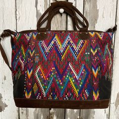 Brand New With Tags Huipil Bag. Overnight Bag Features An Adjustable Strap, Exterior Zippered Pocket, Interior Zippered Pocket And Metal Feet On The Bottom. Made By Indigenous Guatemalan Artisans For Gypsies + Debutantes. All Bags Are Made With Real Leather And Suede. Measurements: 20" Across 15.5" High 7" Deep Multicolor Crossbody Shoulder Bag With Top Carry Handle, Multicolor Crossbody Shoulder Bag With Top Handle, Multicolor Top Handle Shoulder Bag With Adjustable Strap, Multicolor Double Handle Bag With Adjustable Strap, Multicolor Bags With Adjustable Strap And Double Handle, Multicolor Crossbody Shopping Bag, Multicolor Shopping Bag With Adjustable Strap, Multicolor Top Handle Shoulder Bag For Travel, Multicolor Leather Handle Shoulder Satchel