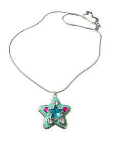 Golden Star Necklace colorful and fun ! Measures 18” long. Trendy Star Charm Necklaces For Parties, Casual Star-shaped Jewelry For Parties, Fun Star-shaped Jewelry For Gifts, Trendy Multicolor Star Jewelry, Trendy Handmade Star Necklaces, Handmade Trendy Star Necklaces, Trendy Star-shaped Charm Necklaces For Parties, Trendy Handmade Star-shaped Necklaces, Trendy Multicolor Star Charm Necklace