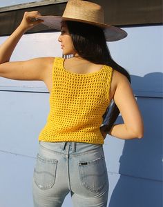 Vintage crochet tank top in yellow. Sleeveless. Scoop neckline. Size S, UK 6-10 / EU 34-38. Measurements- 34"(86cm) bust - 20"(51cm) top length. Material- Wool Condition - Excellent. Care - Handwash Cold Handpicked, repaired and ready to wear. This is an original vintage item, not new and minor signs of wear & age are expected, we will highlight any major flaws.Model is a UK 6/8 and is 5'7" tall Fitted Yellow Crochet Top For Summer, Yellow Crochet Top For Spring And Summer, Fitted Yellow Crochet Top For Spring, Yellow Crochet Top For Spring, Casual Yellow Crochet Top For Summer, Fitted Yellow Tank Top For Summer, Yellow Sleeveless Crochet Top For Vacation, Yellow Tank Camisole Casual Style, Casual Crochet Tank Top