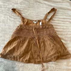 Cute Brown Crop Top From American Eagle. Never Been Worn Casual Brown Tops For The Beach, Chic Brown Tank Top For Beach, Beige Bohemian Tank Top For Day Out, Brown Cotton Summer Tank Top, Brown Cotton Tank Top For Summer, Summer Brown Cotton Tank Top, Brown Cotton Vacation Tops, Fitted Brown Tank Top For Vacation, Brown Cotton Tank Top For Spring