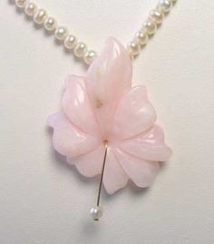 "LOVE GEMMY PINK PERUVIAN OPAL FLOWER Necklace! This is for one 16\" LOVELY Hand strung PINK PERUVIAN OPAL & Freshwater Pearl Necklace!! This natural pink Peruvian opal has been hand carved into a stunning flower and strung & knotted on silk thread for extra durability. PINK PERUVIAN OPAL speaks of the wonderful gentle side of the Divine Feminine. Opal is an overall chakra tuner! Get a boost to your pink energy with this unusual beauty! This necklace is finished with a vermeil toggle cla Valentine's Day Pink Flower Pendant Necklace, Pink Flower Pendant Necklace For Valentine's Day, Mother's Day Pink Flower Pendant Necklace, Pink Flower Pendant Necklace For Mother's Day, Delicate Pink Flower-shaped Necklace, Delicate Pink Flower Shaped Necklace, Pink Flower Necklace For Wedding, Pink Flower-shaped Necklaces For Mother's Day, Pink Wedding Necklace With Flower Charm