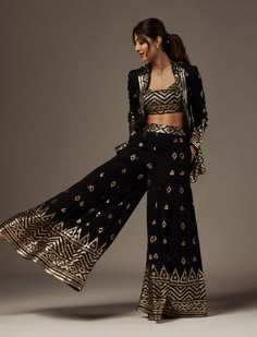 Editor's Note Presenting the magnificent pant set with blazer, an ensemble that seamlessly blends traditional craftsmanship with contemporary design. This exquisite outfit showcases intricate mirror work, sequins, and threadwork, culminating in a mesmerizing tapestry of captivating patterns and designs. Anarkali Embroidered Pant Set With Traditional Drape, Diwali Straight Palazzo Set With Dabka Work, Bollywood Style Sets With Resham Embroidery On Straight Pants, Festive Embroidered Traditional Wear With Straight Pants, Festive Traditional Embroidered Straight Pants, Festive Embroidered Traditional Straight Pants, Festive Embroidered Straight Pants, Traditional Straight Pants Sharara For Festive Occasions, Embroidered Straight Palazzo Set For Festive Occasions