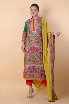 Multi-colored kurta with floral, thread and mirror embroidery. Comes with dhoti pant and a dupatta. - Aza Fashions Festive Chanderi Churidar With Floral Embroidery, Festive Churidar With Floral Embroidery In Chanderi, Dola Silk Churidar With Floral Embroidery For Festivals, Diwali Chanderi Churidar With Floral Embroidery, Diwali Floral Embroidered Chanderi Churidar, Diwali Churidar With Floral Embroidery In Chanderi, Silk Traditional Wear With Floral Embroidery, Festive Silk Kurta With Mirror Work, Traditional Dola Silk Anarkali Set With Multicolor Embroidery