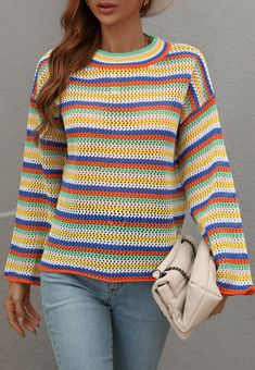 he EMES SHOP sweater is detailed with a beautiful colorful striped pattern. Features a round neck line. drop shoulder. long sleeves. crochet knit material. and loose fit. Pair it with cuffed jeans and sneakers for a cute look.MATERIAL:100% AcrylicMEASUREMENTS: Product Length 23"-24.5"in 4-6-Small | Waist: 25"-26.5"in | Chest: 33"-34.5"in 6-8-Medium | Waist: 26.5"-28"in | Chest: 34.5"-36"in 8-10-Large | Waist: 28"-29.5"in | Chest: 36"-37.5"in 10-12-X-Large | Waist: 29.5"-31"in | Chest: 37.5"-39"i Colorful Long Sleeve Casual Sweater, Casual Striped Color Block Sweater, Casual Striped Knitted Sweater, Multicolor Knit Tops With Ribbed Cuffs, Striped Open Knit Sweater For Fall, Striped Knit Sweater With Crew Neck, Multicolor Oversized Open Knit Sweater, Oversized Multicolor Sweater With Ribbed Cuffs, Oversized Striped Color Block Sweater