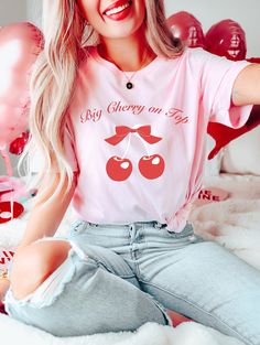 🍒 Get ready to have the CUTEST cherry themed big little reveal with these trendy CHERRY ON TOP big little sorority shirts! They're perfect for a coquette or cherry big little theme 💖 ✨🌷 p r o d u c t   i n f o 🌷✨ * brand: bella canvas 3001 tshirt * 100% cotton * comfy, relaxed unisex fit ✨🌷 s h i p p i n g   i n f o 🌷✨ * processing time = 1-7 days * shipping time = 3-5 days ✨🌷 s h o p  p o l i c i e s 🌷✨ * returns & exchanges are N O T accepted, as all items are made to order with love j Casual Pink T-shirt For Bachelorette Party, Casual Short Sleeve Tops For Bachelorette Party, Casual Graphic T-shirt For Bachelorette Party, Casual Graphic Print T-shirt For Bachelorette Party, Cotton Tops With Letter Print For Bachelorette Party, Casual Crew Neck Top For Bachelorette Party, Cute Red Top With Custom Print, Pink Crew Neck T-shirt With Cherry Print, Casual Cotton T-shirt For Bachelorette Party