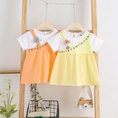 Playful Short Sleeve Cotton Dress, Cute Summer Patchwork Dresses, Cotton Summer Dress For Playwear, Playful Orange Cotton Dress, Playful Yellow Short Sleeve Dress, Playful Cotton Summer Dress, Summer Cotton Patchwork Dresses, Casual Cotton Color Block Dresses, Spring Cotton Patchwork Dress