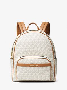 Crafted from Signature Logo canvas, this backpack opens to a spacious interior with room for everything from tablets to books and more. Two exterior slip pockets and a zipper pocket keep essentials within arm’s reach. A polished and effortless essential for campus, work or travel. Michael Kors Backpack Medium, Coated Canvas Backpack With Logo, Coated Canvas Standard Backpack With Logo, Coated Canvas Logo Backpack, Coated Canvas Travel Backpack, Travel Backpack In Coated Canvas, Travel Backpack With Removable Pouch In Coated Canvas, Leather Backpack With Logo For Everyday Use, Travel Logo Bags For Back To School