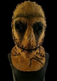 an image of a creepy mask on display