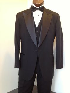 These Brand New Classic Black Tuxedo jackets are a great addition to anyone's wardrobe who has formal functions occasionally.  Elegant styling includes; full satin peak lapels and pocket trim, single button front closure with a non vented back. These coats are constructed for rental use and are made of the finest 100% worsted wool (not cheap imported polyester) Tuxedo jackets are classically worn with black pants, white pleated shirts, black cummerbunds and bow ties. We have all of these items f Cheap Elegant Formal Bow Tie, Classic Black Tuxedo, Black Tuxedo Jacket, Black Tuxedo, Shirts Black, Peak Lapel, Tuxedo Jacket, Mens Formal, Pants White